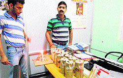 Officials of the District Food Safety Department collect samples of milk at Hamirpur on Thursday