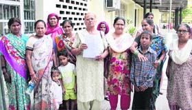 Women outside the office of the Deputy Commissioner after giving a representation regarding the shifting of the Central Town dispensary in Jalandhar on Thursday