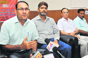 Members of All J&K Sad Guru Kabir Sabha address mediapersons in Jammu on Thursday.