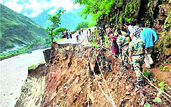 Army personnel rescue stranded persons in Chamoli district on Thursday