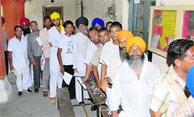 Candidates for the panchayat elections queue up to get their nomination forms scrutinised in Jalandhar on Thursday