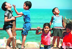 Palestinian children at a refugee camp in Gaza City on Wednesday.  AFP