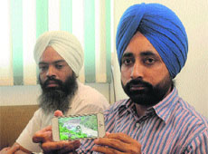 Pilgrims after returning from Hemkund Sahib in Mohali on Friday. 