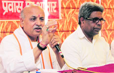Vishwa Hindu Parishad general secretary Praveen Togadia addresses mediapersons in Dehradun on Friday. 
