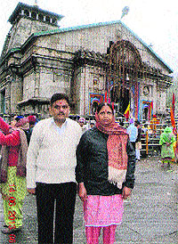 Phagwara residents Girish Sharma and his wife Sushma Sharma at the Kedarnath temple on June 14