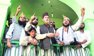 Supporters of Mirwaiz Qazi Ahmad Yasir protest against his detention in Anantnag  on Friday. 