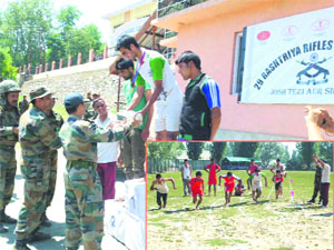 Army officers felicitate winners of the athletic meet that concluded at Pattan, (inset) players in action during one of the events. 