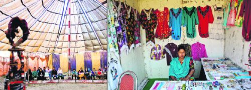 An acrobat tries to balance while performing a stunt during an exhibition-cum- fair in Srinagar and a woman sells clothes at a stall at the exhibition.