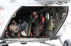 Stranded people being airlifted from Guptkashi, near flood-hit Kedarnath, in Uttarakhand.  PTI