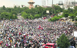 Thousands of people protest against rising crime in Kolkata on Friday.  PTI
