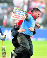The India-Sri Lanka match witnessed quite a few persons intruding into the ground with LTTE fag.