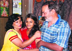 A family in a jubilant mood after returning from Uttarakhand, at their residence in Sector 10, Panchkula, on Saturday