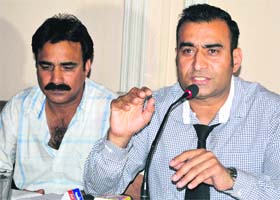 Doctors Association Kashmir president Nissar-ul-Hassan talks to mediapersons in Srinagar on Saturday