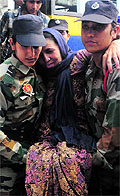 Women commandos help Manmohan Kaur, one of the survivors, at the ISBT-43 relief camp in Chandigarh on Sunday