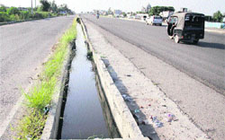 An uncovered storm water drain along the GT road in Jalandhar.