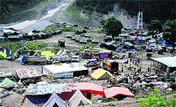 Temporary sheds and community kitchens being set up at Baltal near the Sonmarg base camp, about 115 km from Srinagar, as part of the preparations for the Amarnath yatra