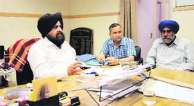 PSPCL Superintending Engineer Balbir Singh (left) in Amritsar.