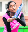 Saumya Sazena returns a shot during a tennis match at the CLTA in Chandigarh on Monday. tribune photo