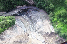 A road damaged near Guptkashi on the Kedarnath axis in Rudraprayag district. 
