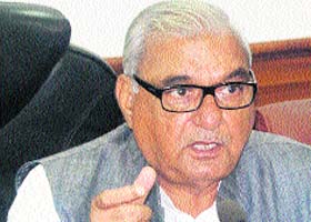 Chief Minister Bhupinder Singh Hooda addresses a press conference in Chandigarh on Monday