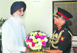 Lieutenant General Sanjiv Chachra Chief Minister Parkash Singh Badal in Chandigarh on Monday.