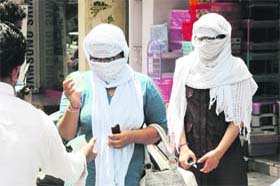 Summer sufferings: The heatwave conditions are forcing the residents of Bathinda to cover their faces everytime they step out of their homes