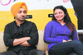 Diljit Dosanjh and Neeru Bajwa, who were in the city for the promotion of Jatt & Juliet 2, during a press meet in Bathinda on Tuesday