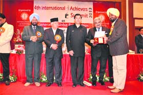 Chairman of Hi-Tech Polytechnic College, Jai Singh Wala village, Charanjeet Singh Brar receives the Best Performer of the Year award