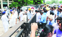 Congress supporters protest against rejection of their candidates nomination papers for the seat of Sohana sarpanch outside the Deputy Commissioners office in Phase I, Mohali, on Tuesday.