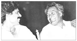 Kapil Dev shares a lighter moment with his coach, DP Azad, during a felicitation function at the Tagore Theatre on his return from England after winning the World Cup in 1983.