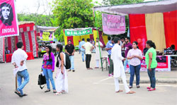 Students get information from help desks set up by student parties at the PU on Tuesday. 