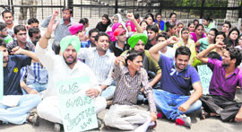 Students hold a protest outside the VCs office at Panjab University on Tuesday. 