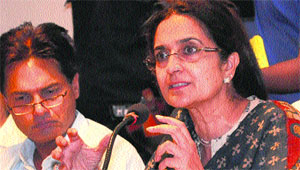 Excise Minister Kiran Chaudhry addresses mediapersons in Chandigarh on Tuesday. 