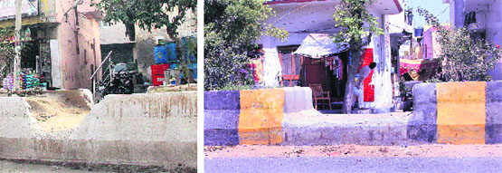 Dividers broken at several places on a number of roads in Jalandhar. Photos : Sarabjit Singh