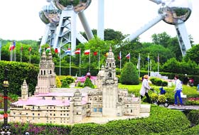 Small wonder: People visit Mini-Europe, a park displaying miniature reproductions of well-known buildings within the European Union's countries, in Brussels on Monday