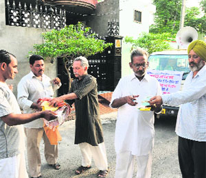 Funds being collected for victims of disaster-hit Uttarakhand, at Balla Ram Nagar in Bathinda on Wednesday.