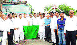 Deputy Commissioner Chander Shekhar flags off a truck carrying relief material for victims of the Uttarakhand flash floods in Kaithal on Wednesday