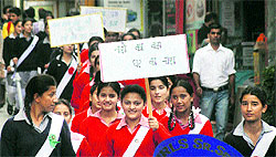 Schoolchildren take part in a campaign on International Day against Drug Abuse and Illicit Trafficking-2013 in Shimla on Wednesday