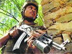 A jawan at the encounter site in Rajouri district.