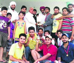 The winning team of the Punia Wires Cricket Club with prizes at Chhapar Stadium near Mandi Ahmedgarh. a tribune photograph