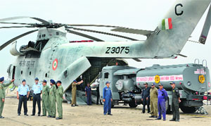 A fuel bowser being loaded into Mi 26. 