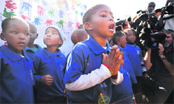 A student chants a prayer as his class visits Medi-Clinic Heart Hospital where former South African President Nelson Mandela is being treated in Pretoria on Wednesday.  Reuters