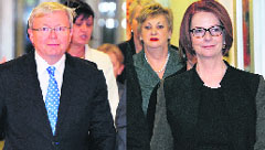 Former Australian PM Kevin Rudd (L); and PM Julia Gillard leave the party room after a leadership ballot in Canberra on Wednesday.  AFP
