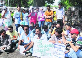 Students hold a protest outside the Vice-Chancellor’s office at Panjab University, Chandigarh, on Thursday