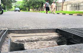 An uncovered drain on the way to the OPD block