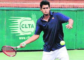 Tanjit Singh in action during the CLTA-AITA Talent Series Tennis Tournament in Chandigarh on Thursday