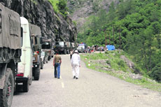 Army vehicles near Gobind Ghat in Chamoli district on Thursday.