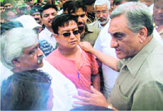 Uttarakhand Chief Minister Vijay Bahuguna meets disaster victims at Dharchula in Pithoragarh district on Thursday. 