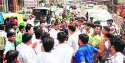 Residents of Sector10 in Gurgaon block traffic in protest against blocked sewers on Thursday.