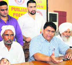 District president of the Peoples Party of Punjab Navjot Singh Dahiya along with other party leaders addresses mediapersons in Jalandhar on Thursday. 